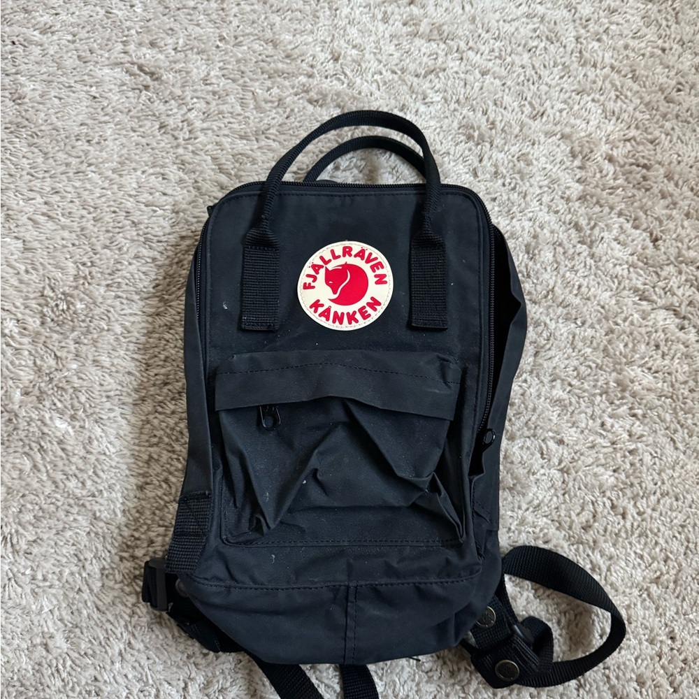 Fjallraven small backpack.  Gently used. No tears. Coms with original foam pad.